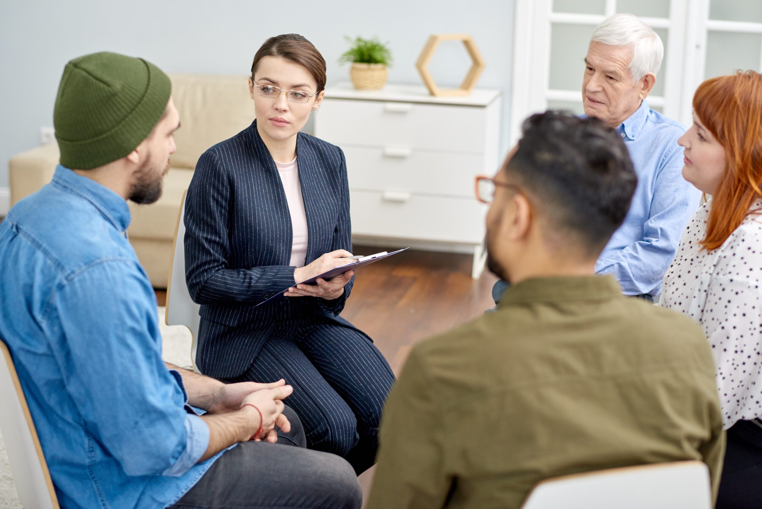 Confident Young Psychologist Discussing Problem